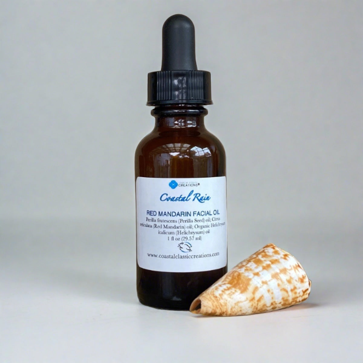 Bottle of red mandarin facial oil as a natural solution for rosacea and dermatits