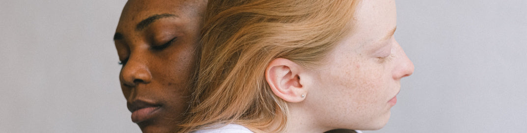 Two women hugging and comforting each other