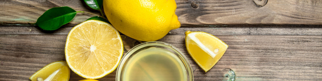 Lemon shaped natural antibacterial soap on granite background