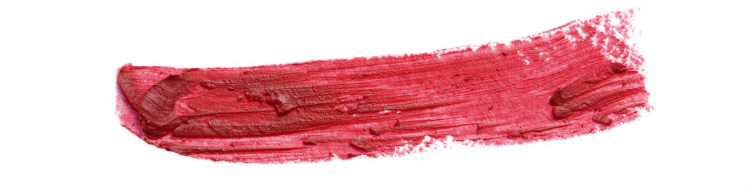 Closeup of a smudge of red lipstick on a white background