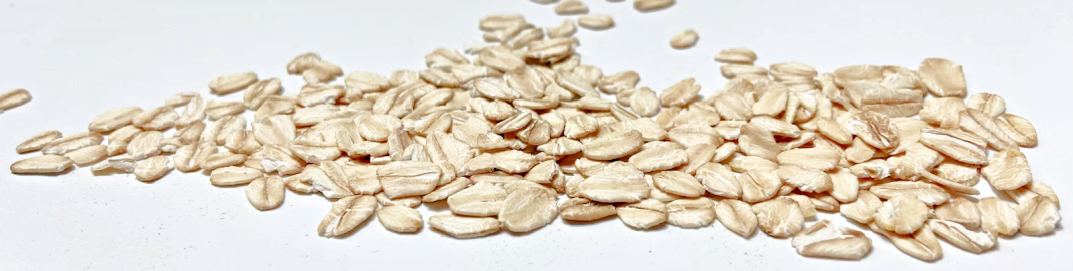 Oatmeal scattered on a white background