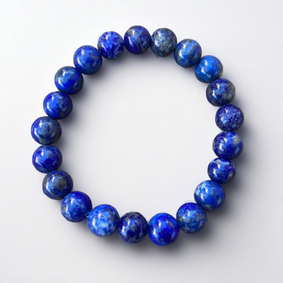 Lapis lazuli stretch cord bracelet on rock background