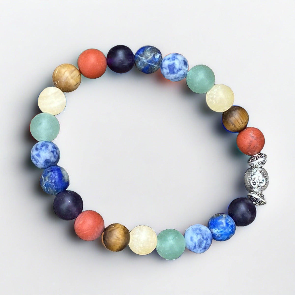 Close-up of Om Chakra Bracelet – featuring amethyst, lapis, aventurine