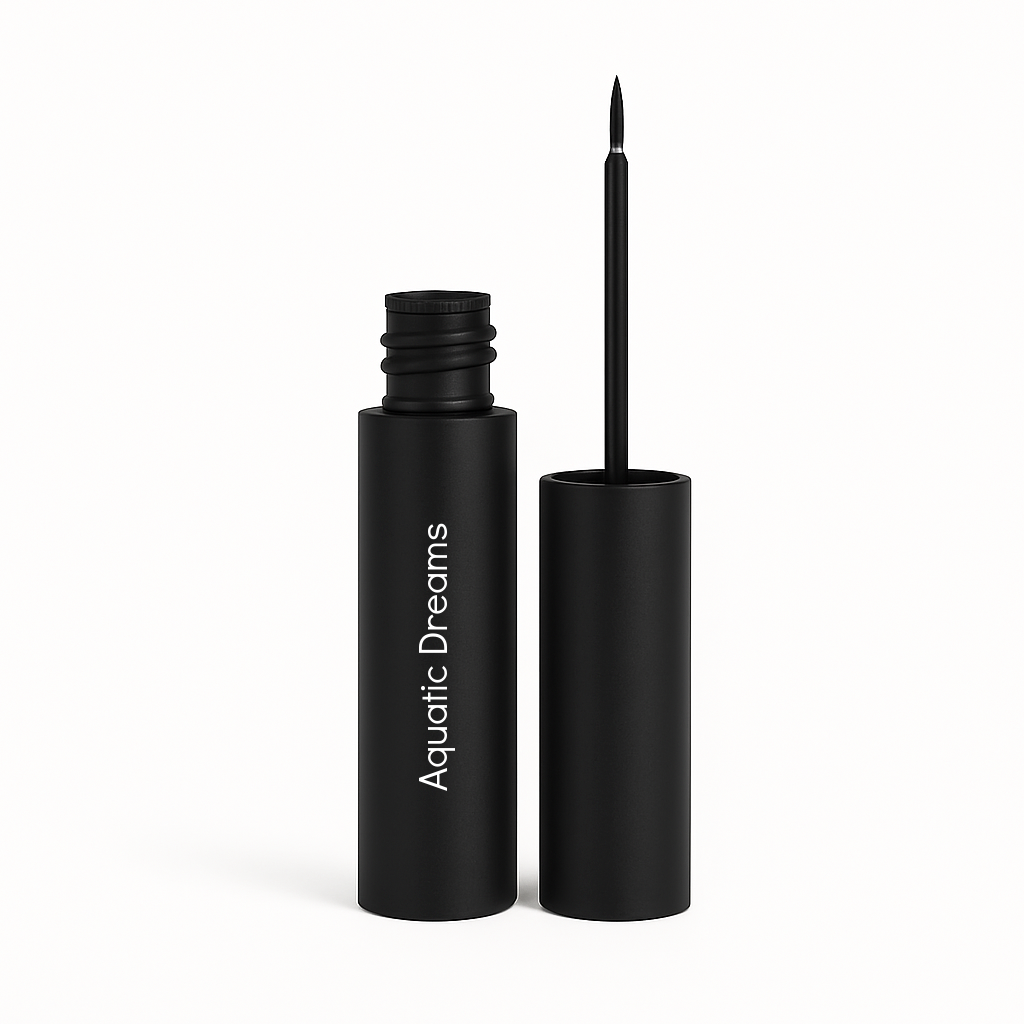 Sleek matte black eyeliner tube labeled “Aquatic Dreams” with cap removed and fine-tip brush applicator on white background