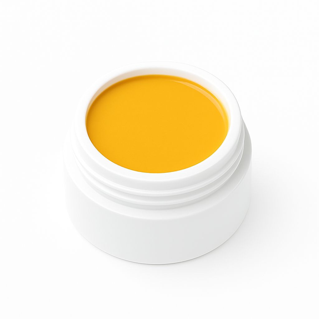 Open white jar filled with orange butter lip balm, photographed against a clean white background