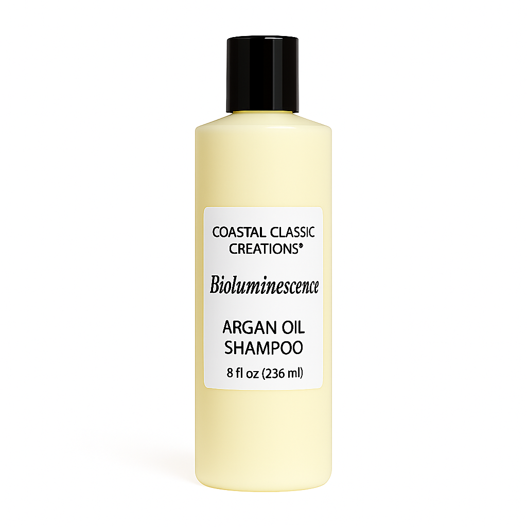 Bioluminescence Argan Oil Shampoo in pale yellow 8 oz bottle with black cap, shown on a white background
