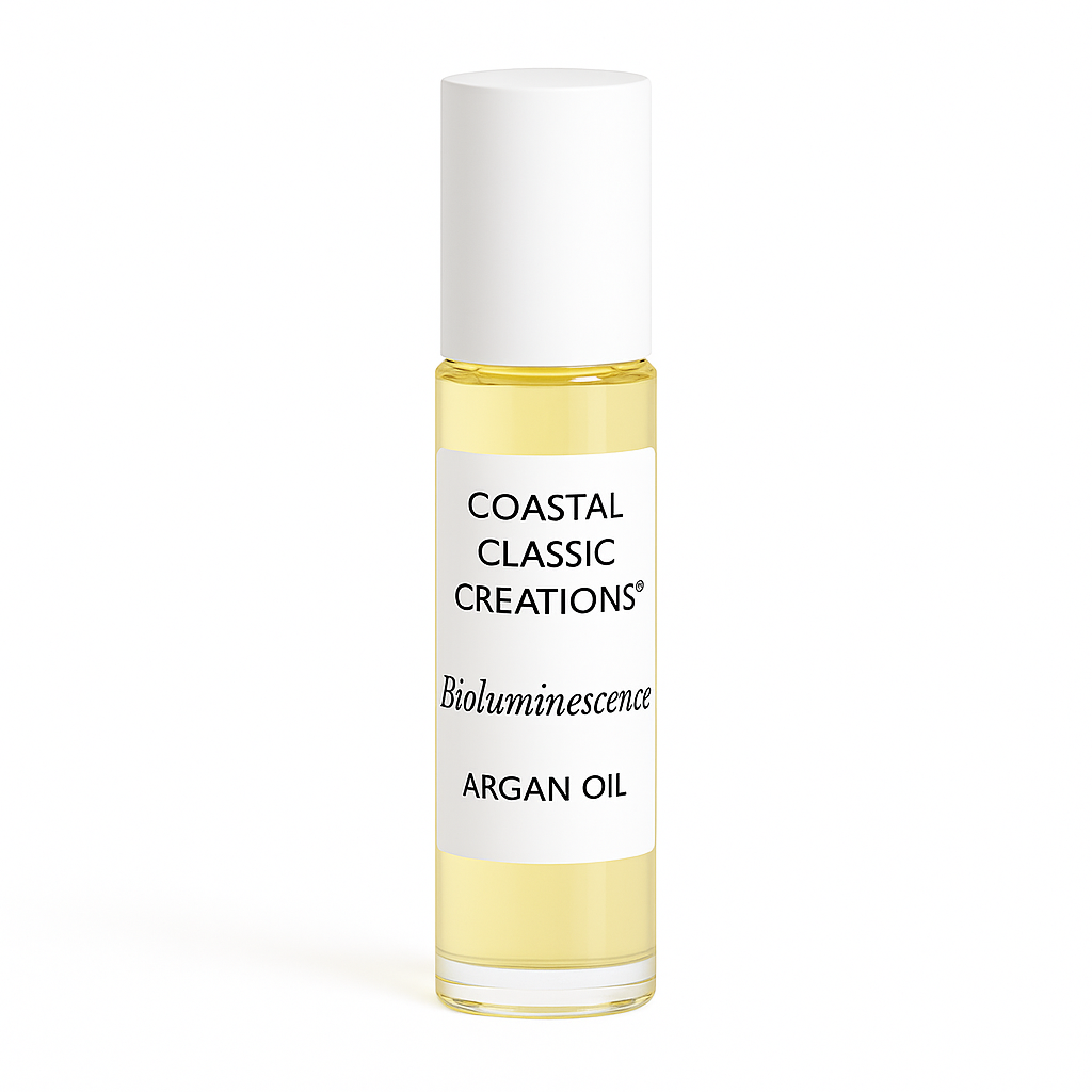 Travel-size Bioluminescence Argan Oil in roll-on bottle with white label and cap, showing golden oil on pure white background