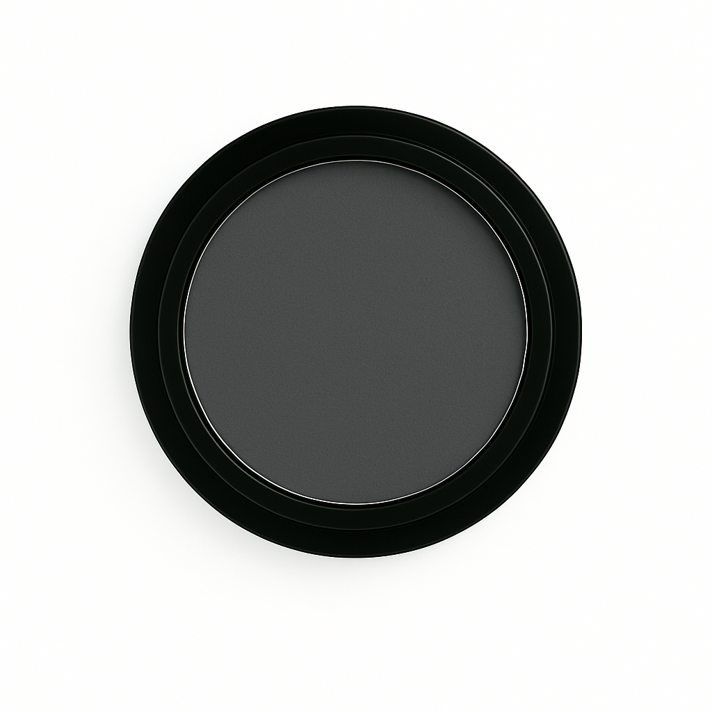 Round pan of charcoal gray matte eyeshadow in a black compact, displayed on a clean white background