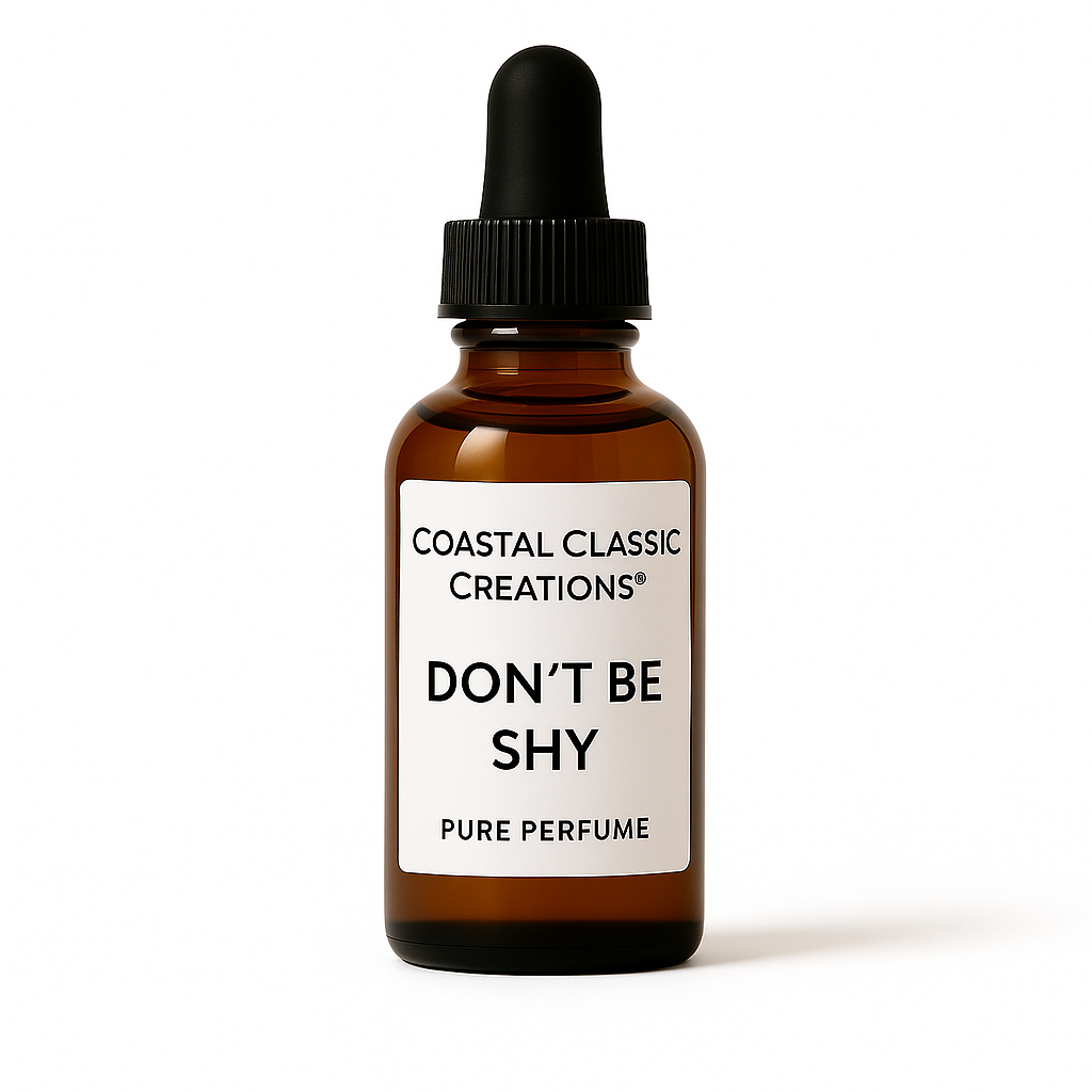 Bottle of Don’t Be Shy Type Pure Perfume with notes of neroli, honeysuckle, rose, marshmallow, and amber