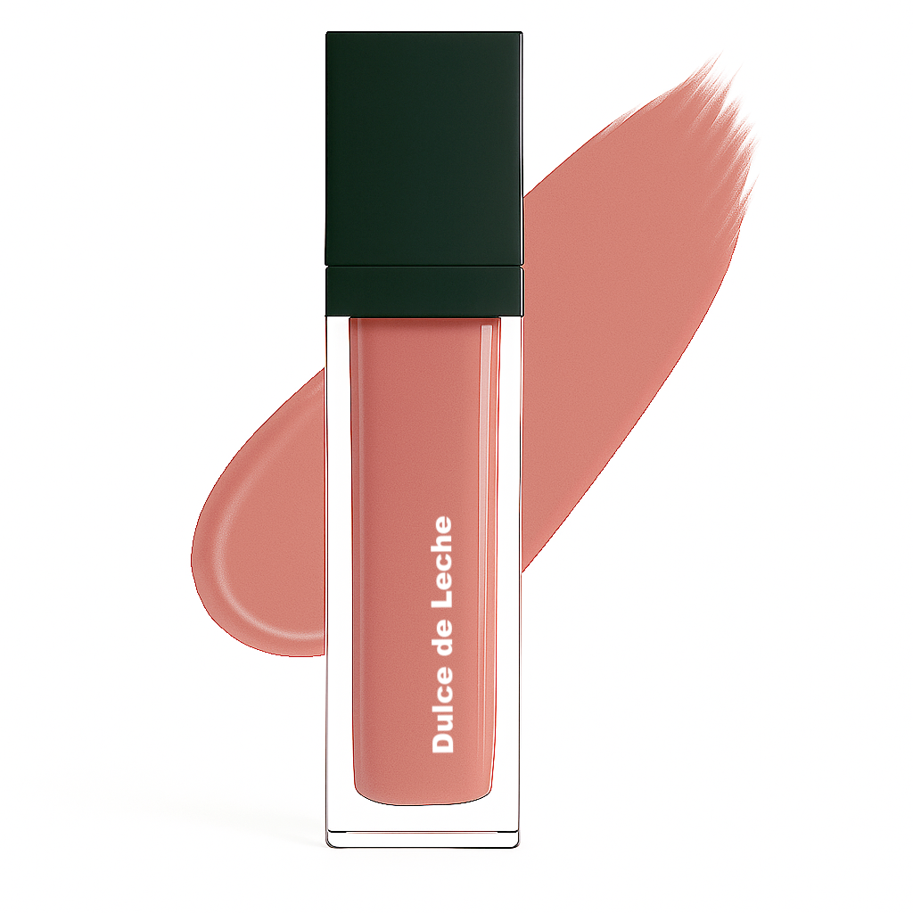 Dulce de Leche lip gloss in clear square tube with black cap, shown with warm nude pink swatch on white background