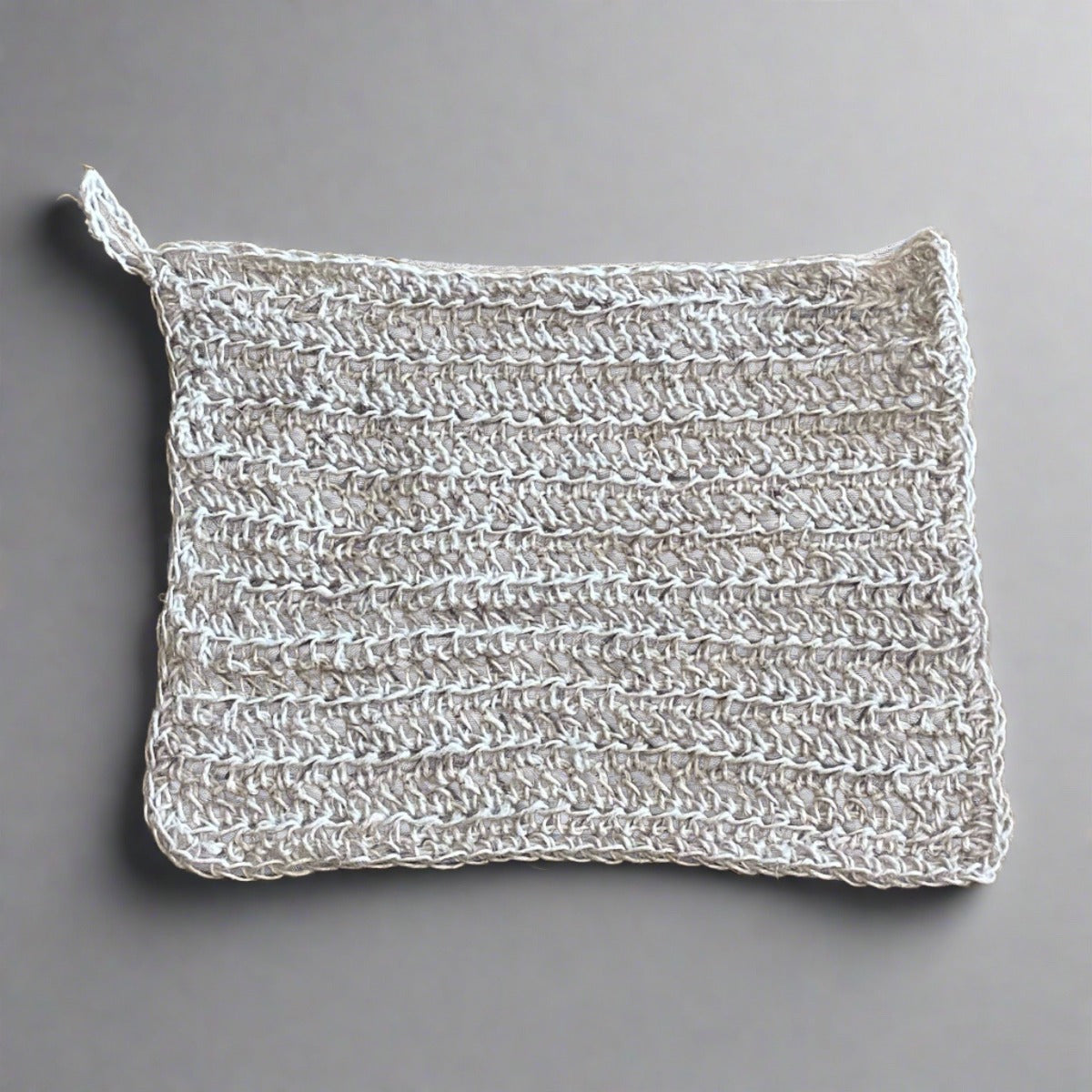 A soft hemp washcloth, displayed against a neutral background