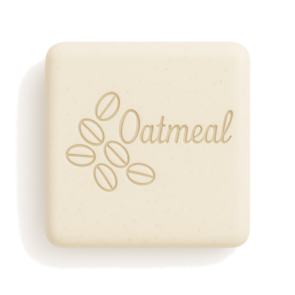Square bar of oatmeal soap in a light cream color with subtle speckles and embossed oatmeal design and text, shown on a white background