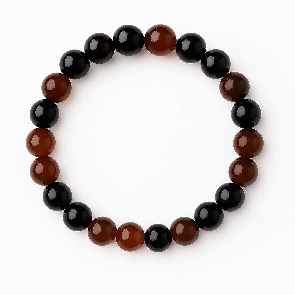 Polished bracelet with alternating glossy black and deep orange agate beads, arranged in a circle on white background