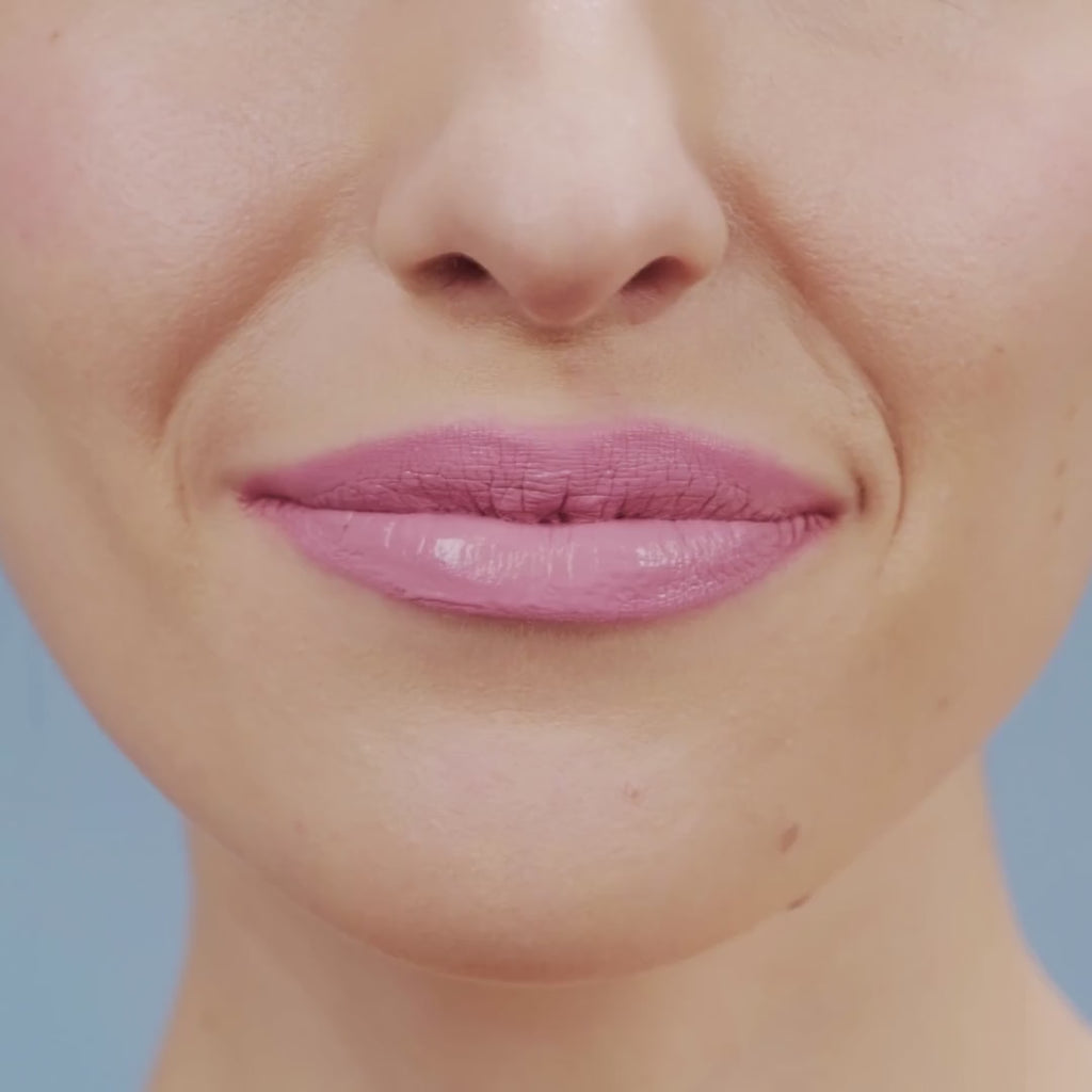 Pink Princess lead-free, non-toxic cool pink lipstick shown on lips in a demonstration video by Coastal Classic Creations