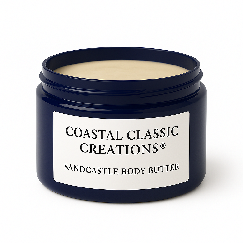 Navy blue jar of Sandcastle Body Butter with cream label and butter-colored product, lid off, shown on a white background
