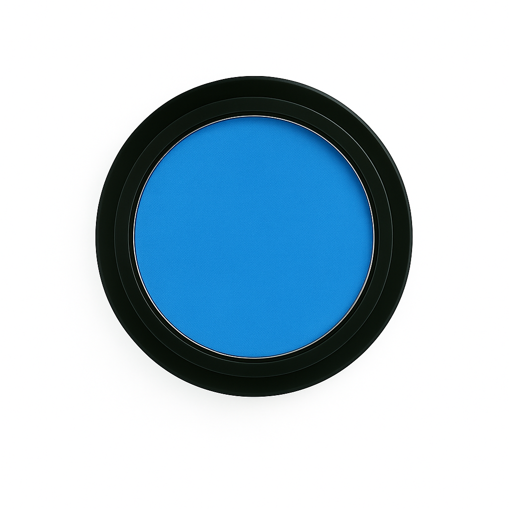 Round pan of bold matte turquoise blue eyeshadow in black compact, displayed on a pure white background