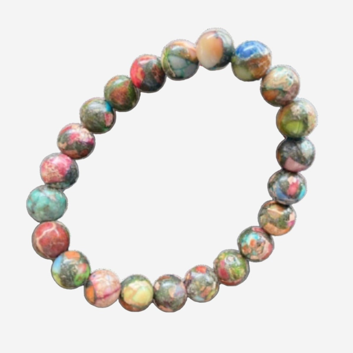 Mardi Gras Impression Jasper & Pyrite Happiness Bracelet featuring vibrant 8mm gemstones, displayed on a textured rock background.