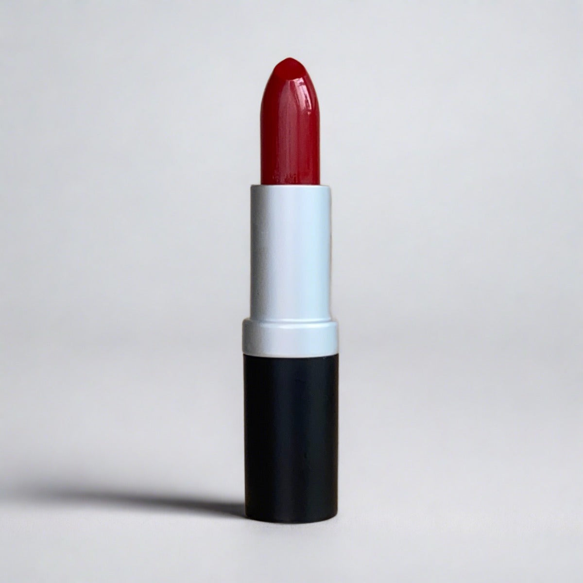 Raisin color lipstick on granite background