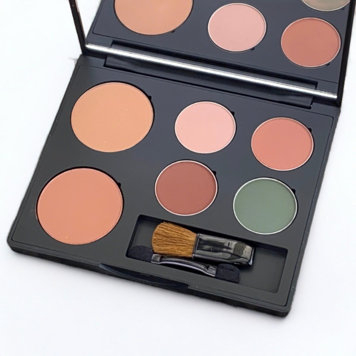 Warm palette with four eyeshadows and two blush pans for warm skin tones