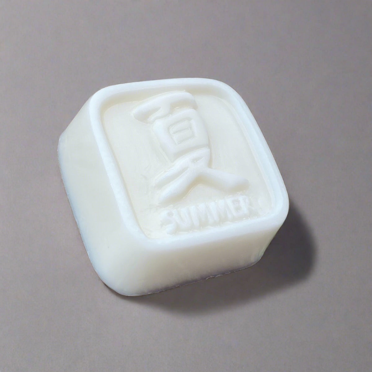Bar of white soap with beautiful Chinese symbols meaning "summer" design
