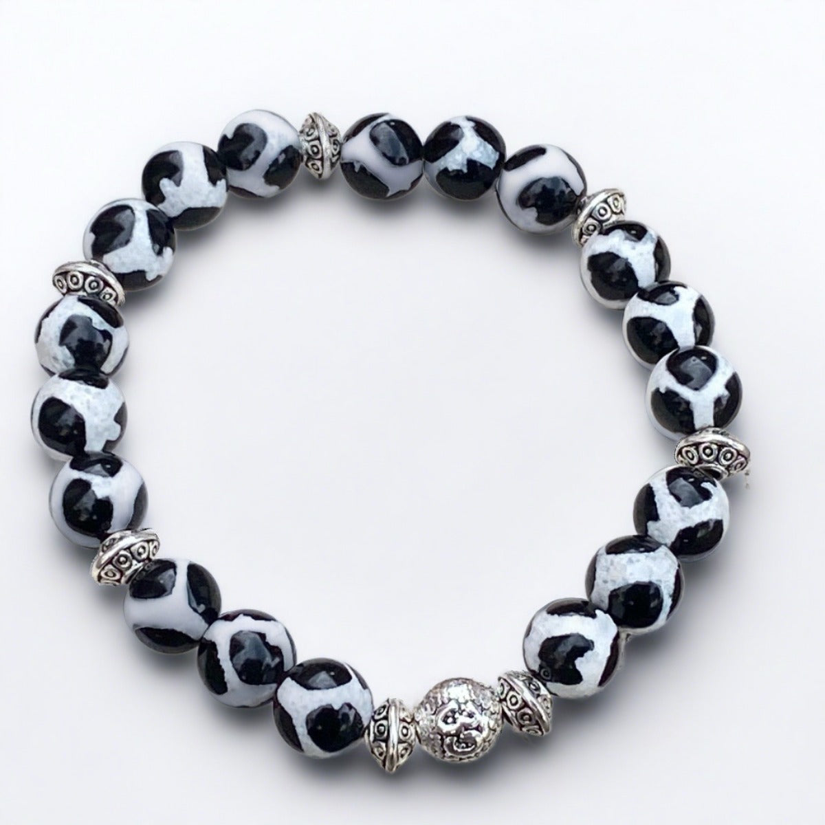 Tibetan Dzi Agate Mindfulness Bracelet, inspired by Tibetan culture, featuring agate stones that promote mindfulness and inner peace