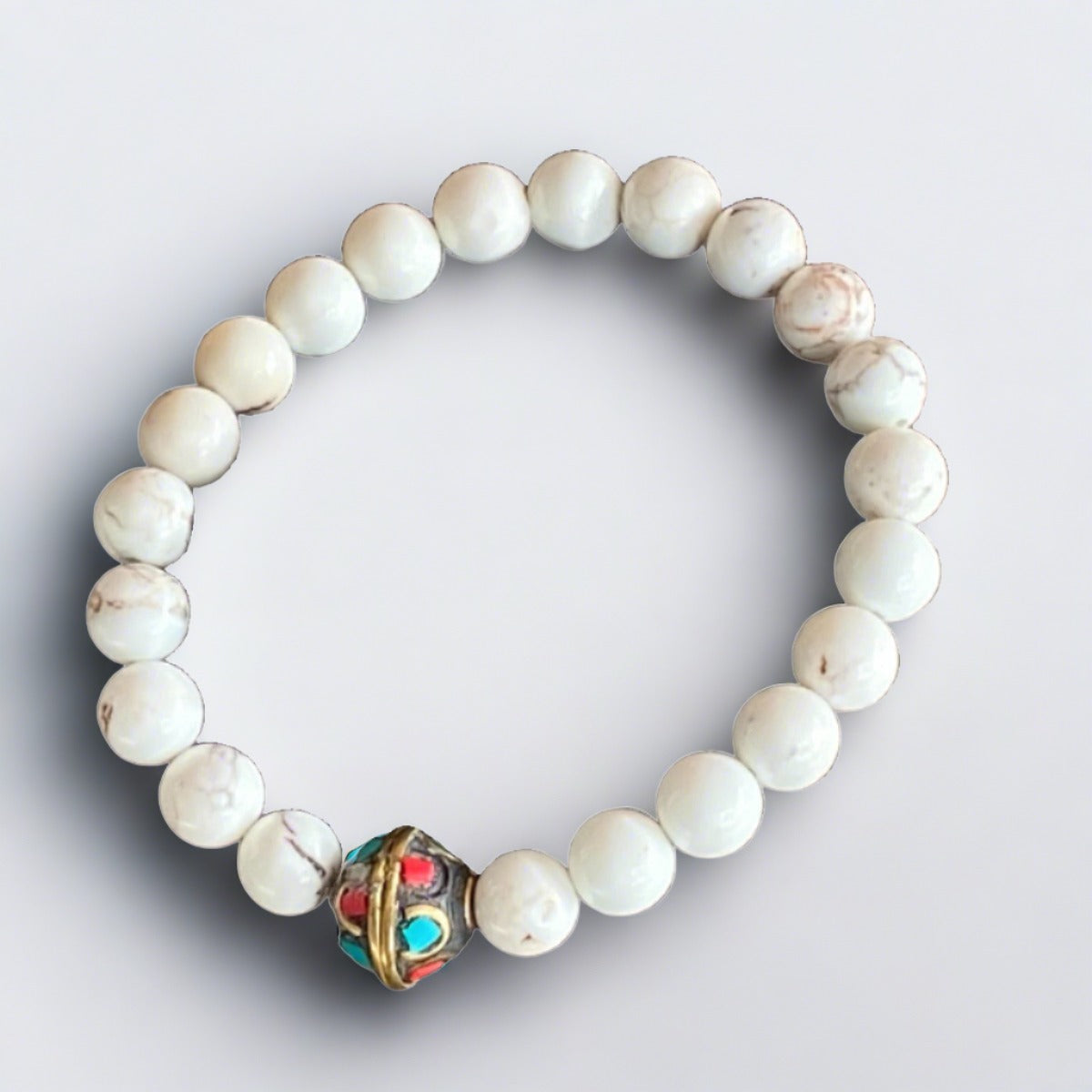 White magnesite 8 mm gemstone mala bracelet with Tibetan coral and turquoise cylindrical  bead