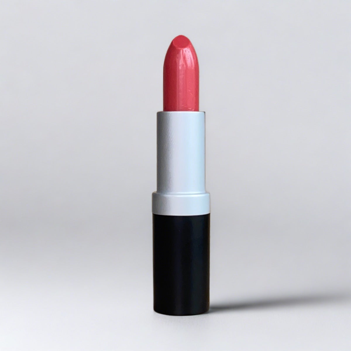 Bold, bright, strawberry red Tender Lipstick